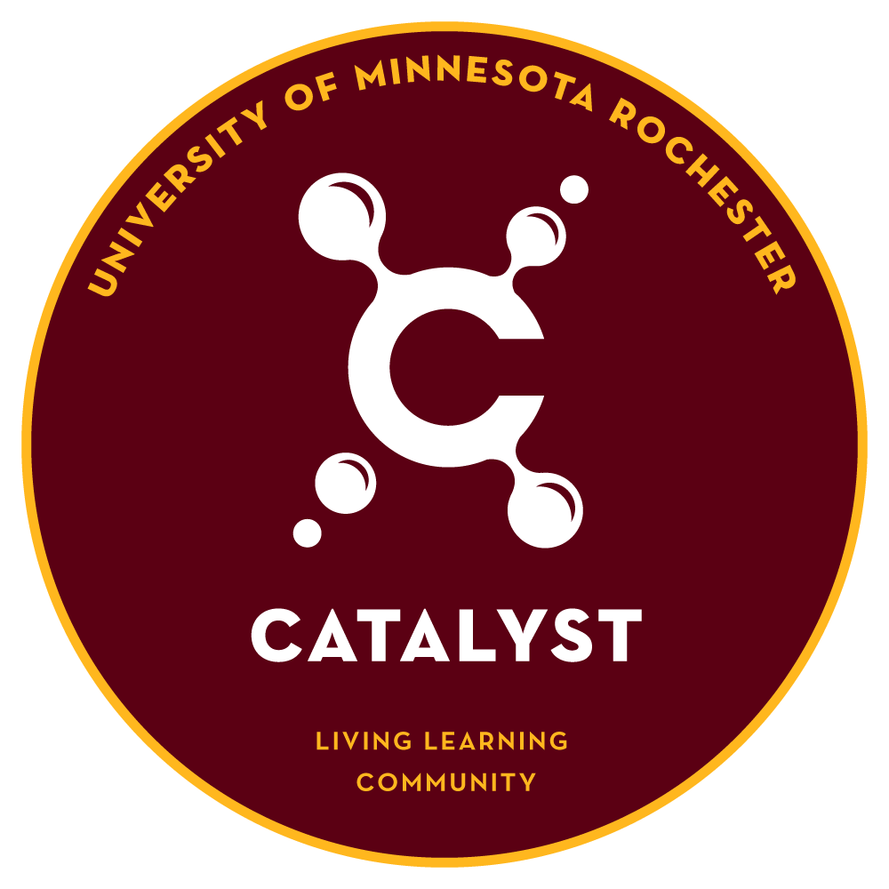 Circular emblem with maroon background and yellow border reads “University of Minnesota Rochester” and “Catalyst.”