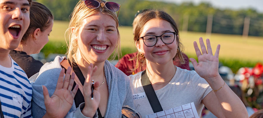 UMR students waving at camera at Raptor Reconnect.