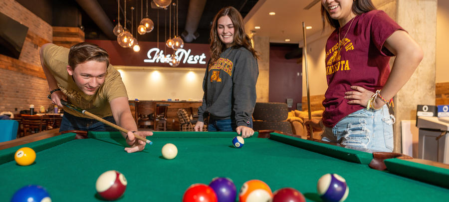 UMR students playing pool at The Nest in 318 Commons. 