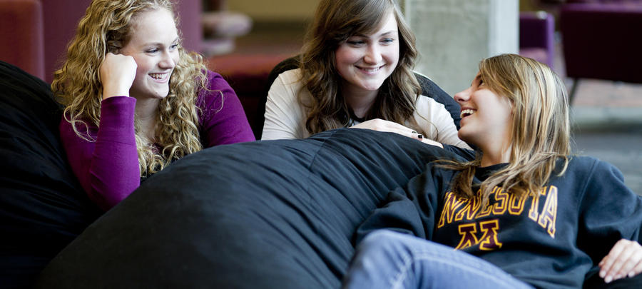 UMR students sitting on bean bag hanging out. 